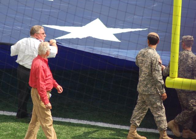 A/C Chornock presents the &quot;Colors&quot; in honor of the 9/11 Remembrance at the Raven's game.